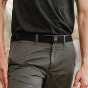 Man shown wearing a University of Montana Griz JeltX Adjustable  belt in black